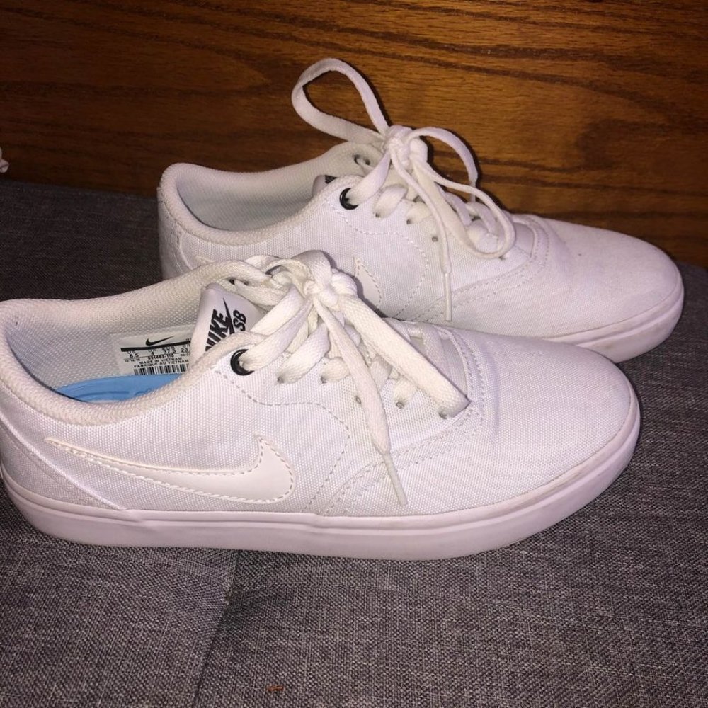 White Nike SBs